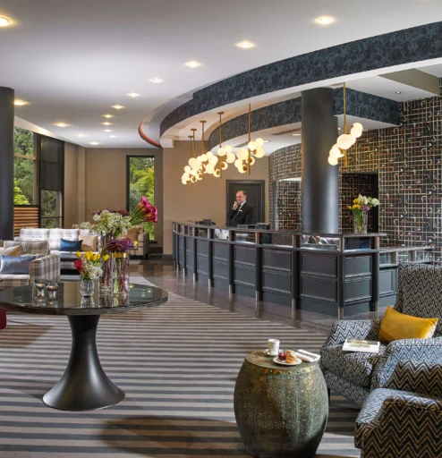 Elegant hotel lobby with a welcoming atmosphere and stylish decor.