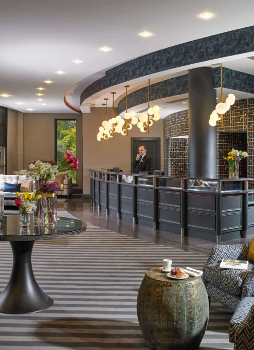 Elegant hotel lobby with a welcoming atmosphere and stylish decor.