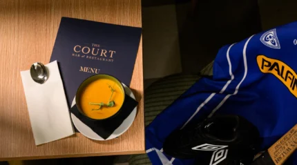 Cosy dining scene with soup and menu at Tullamore Court Hotel.